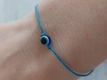 Kép 1/2 - Nazar szeme kék amulett pöttöm sötétkék karkötő
