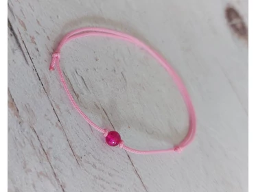 Rózsaszín nanocord karkötő apró sötét-rózsaszín roppantott üveggyönggyel