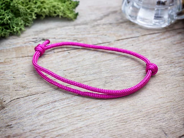 Megérzés pink paracord karkötő
