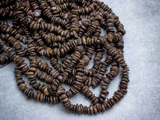 Rendet teremtő bronzit szemcse ásvány
