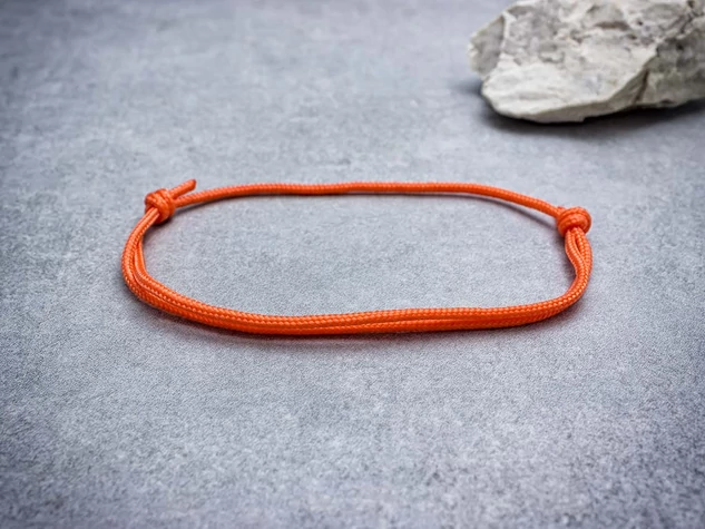 Megvilágosodás narancssárga paracord karkötő